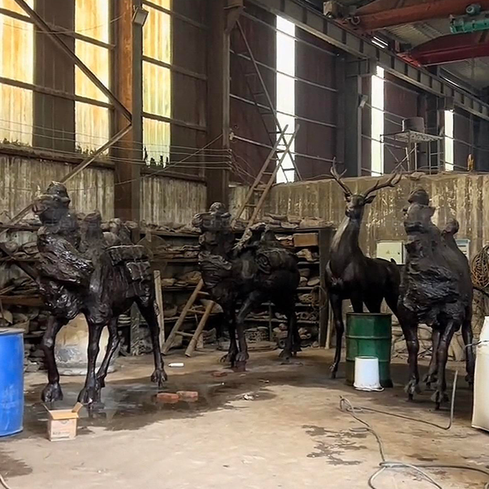 Bronze large camel statue group inside workshop