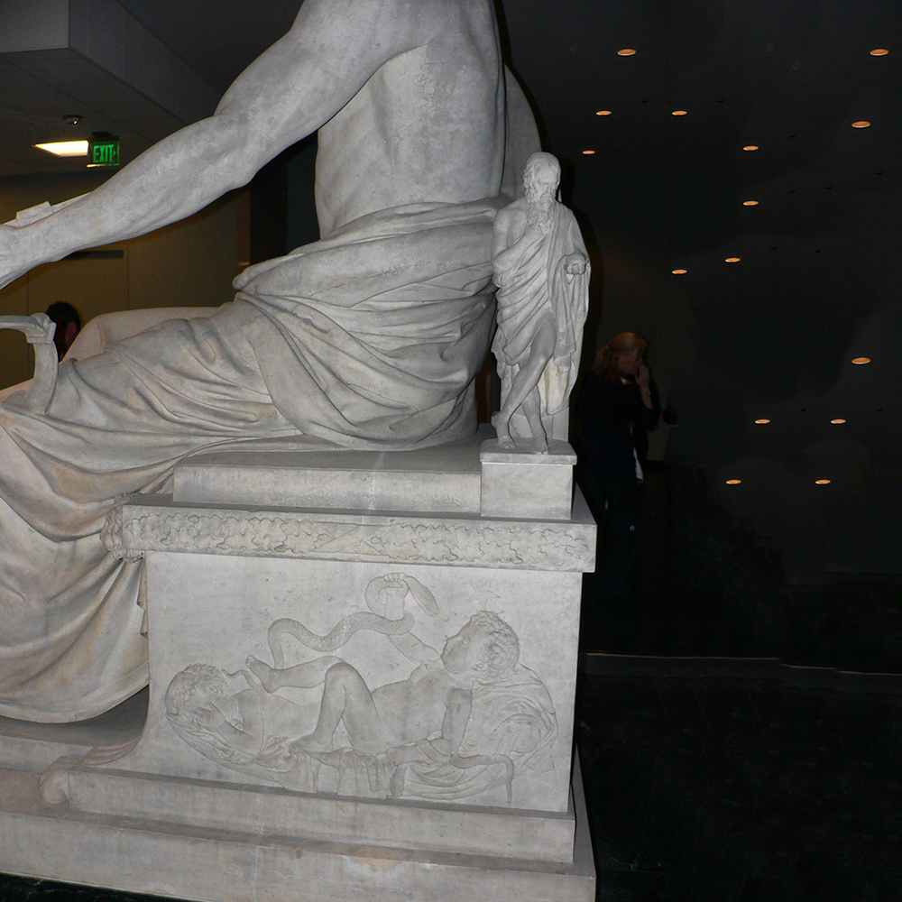 Carved throne relief beside Enthroned Washington figure