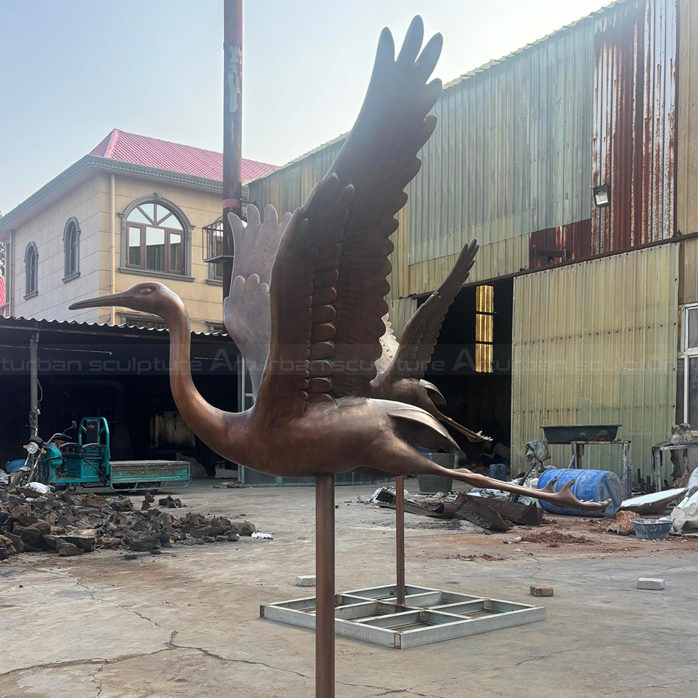 Crane Yard Statue bronze outdoor flying profile