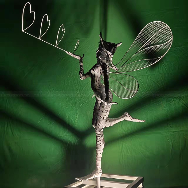 Fantasy Wire Fairy Sculptures for Sale holding heart branch
