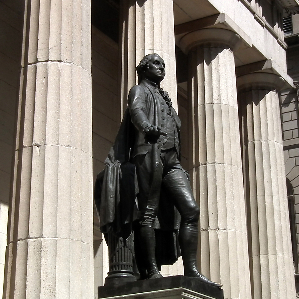 Federal Hall bronze Washington beside stone columns