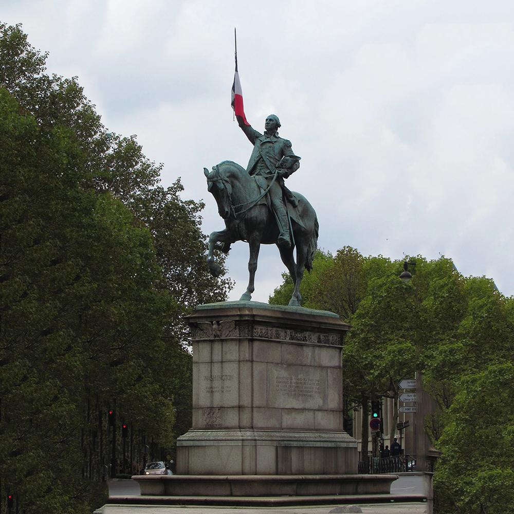 George Washington statue on monumental stone pedestal