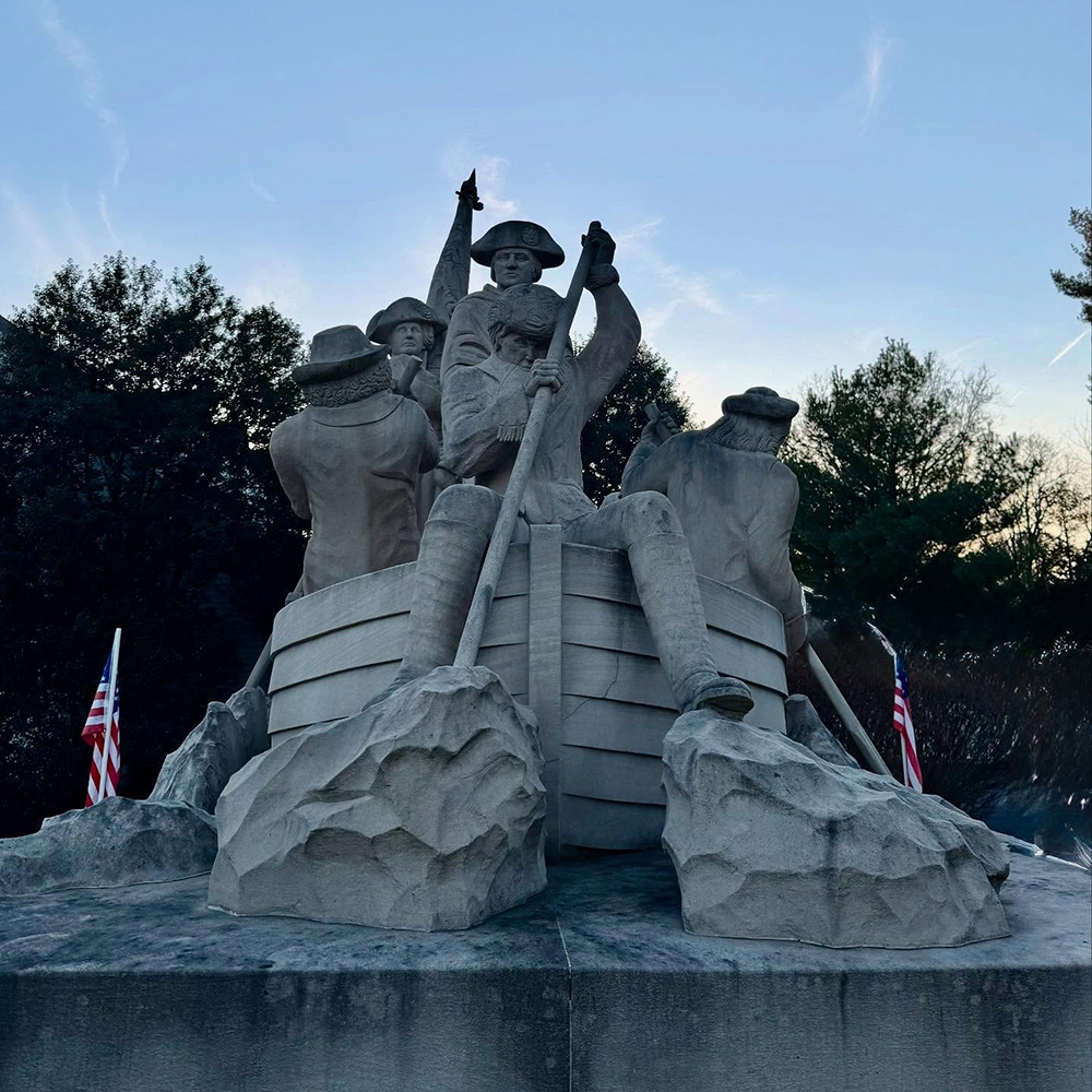 Limestone boat sculpture recreating Delaware crossing