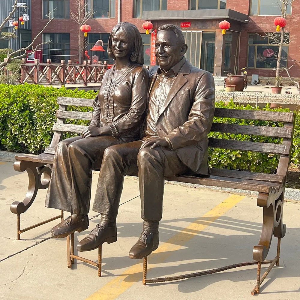 Old Couple on Bench Garden Statue outdoors
