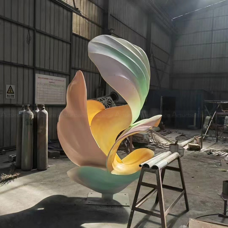 Pastel stainless steel abstract flower statue side view