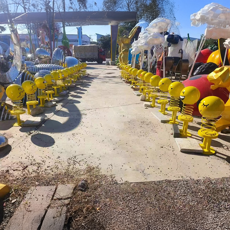Rows of colorful Smiley Face Statue designs
