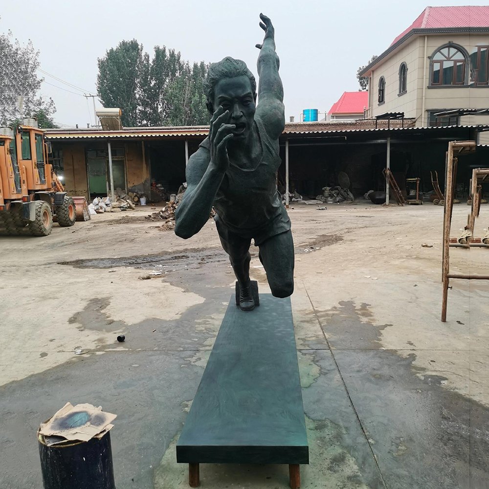 Running Man Sculpture bronze front running view
