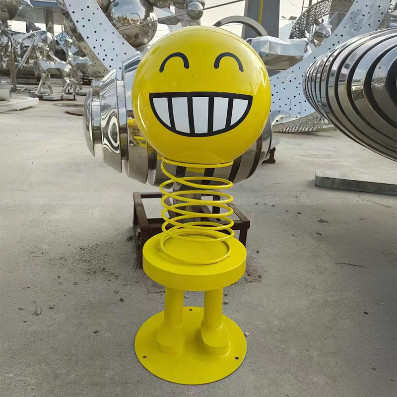 Smiley Face Emoji Statue with cheerful wide grin