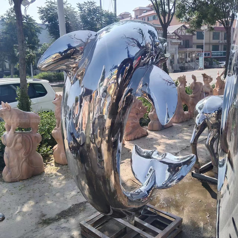 Stainless steel dolphin garden sculpture