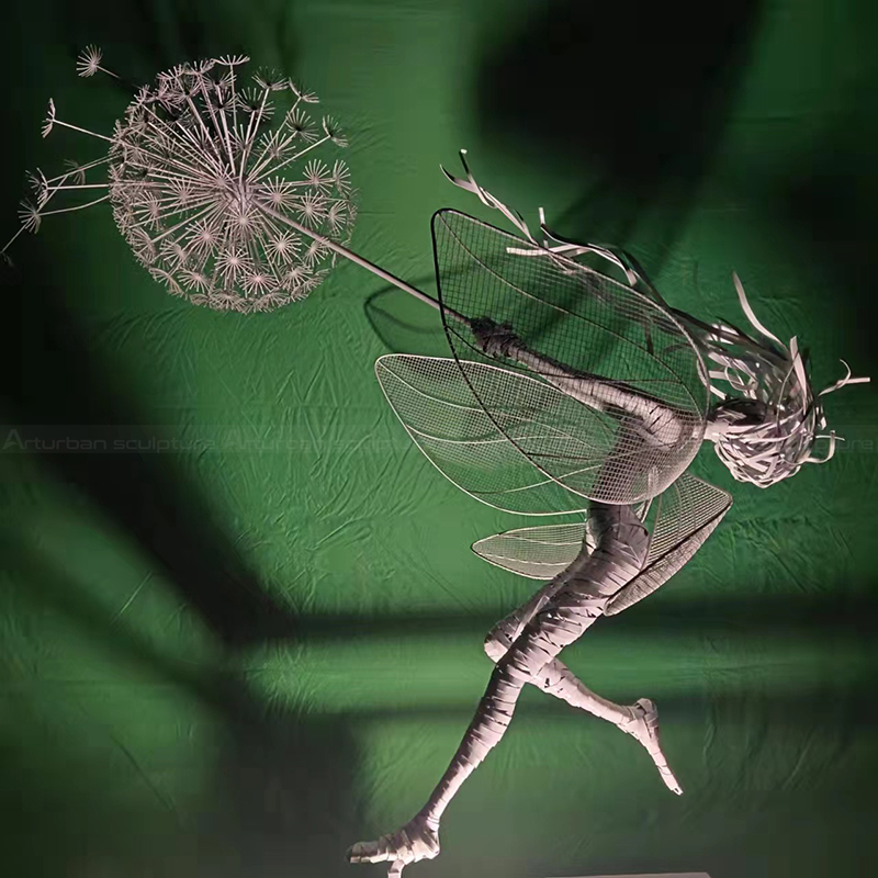Stainless steel fairy with dandelion sculpture