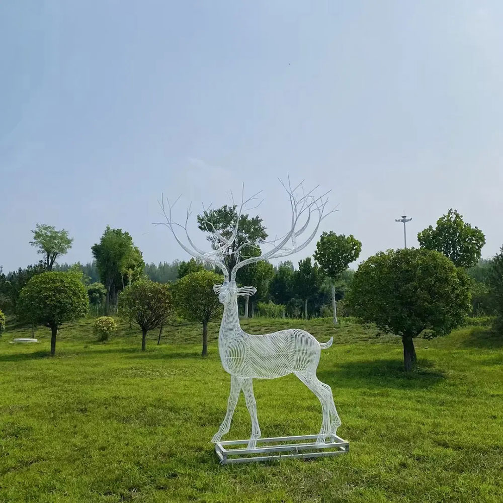 Standing Wire Deer Statue on green lawn
