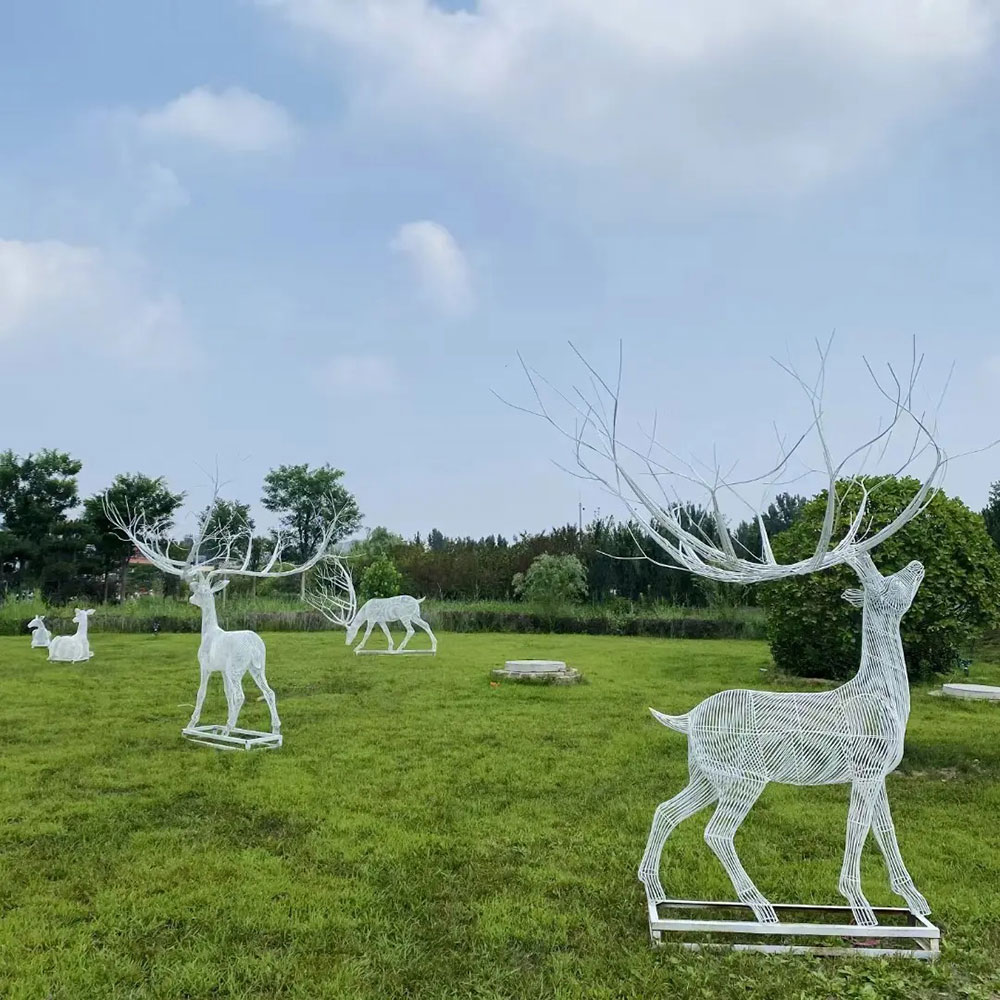 Wire Deer Statue group displayed across lawn