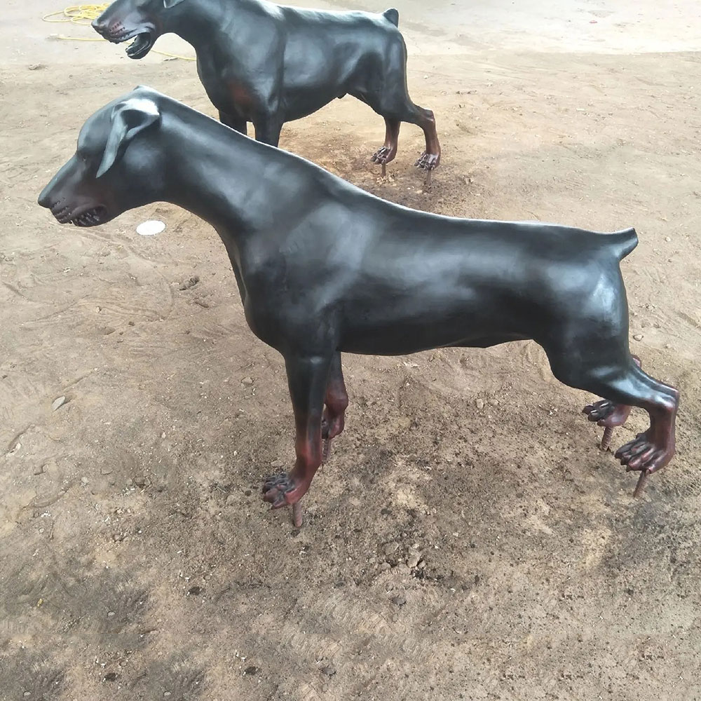 Bronze Doberman Yard Statue Showing Muscular Body