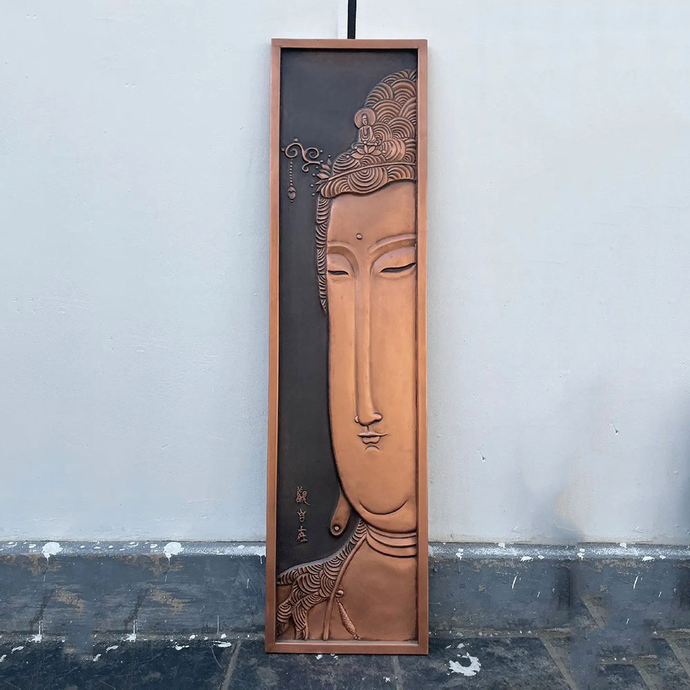 Bronze Guanyin Relief with Serene Half Face