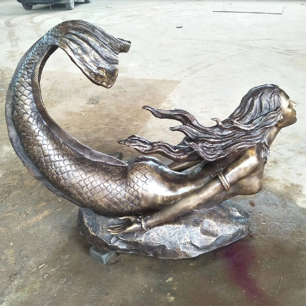 Bronze Mermaid Lying Down Statue on Rock Base