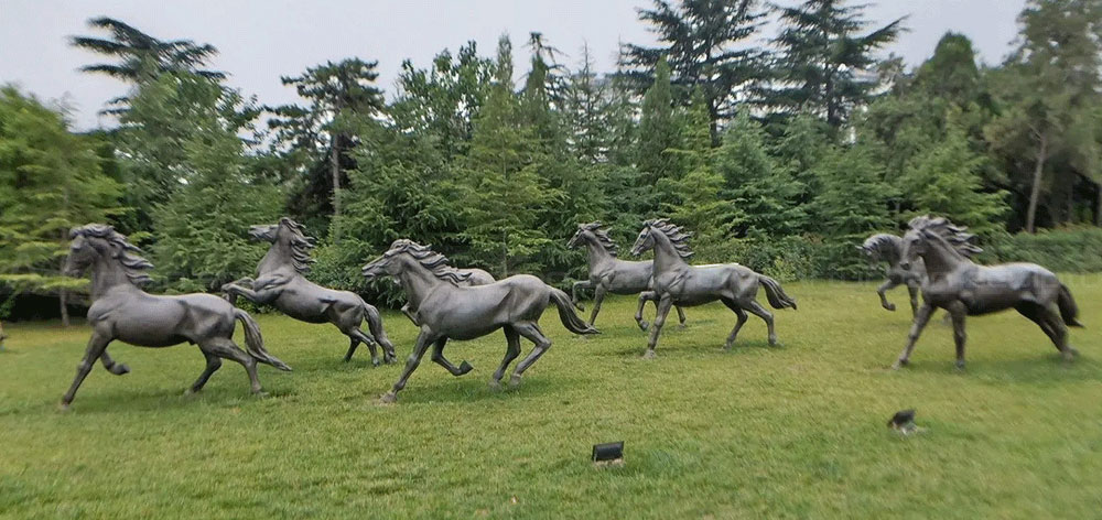 Bronze Running Horse Statue Display on Garden Lawn