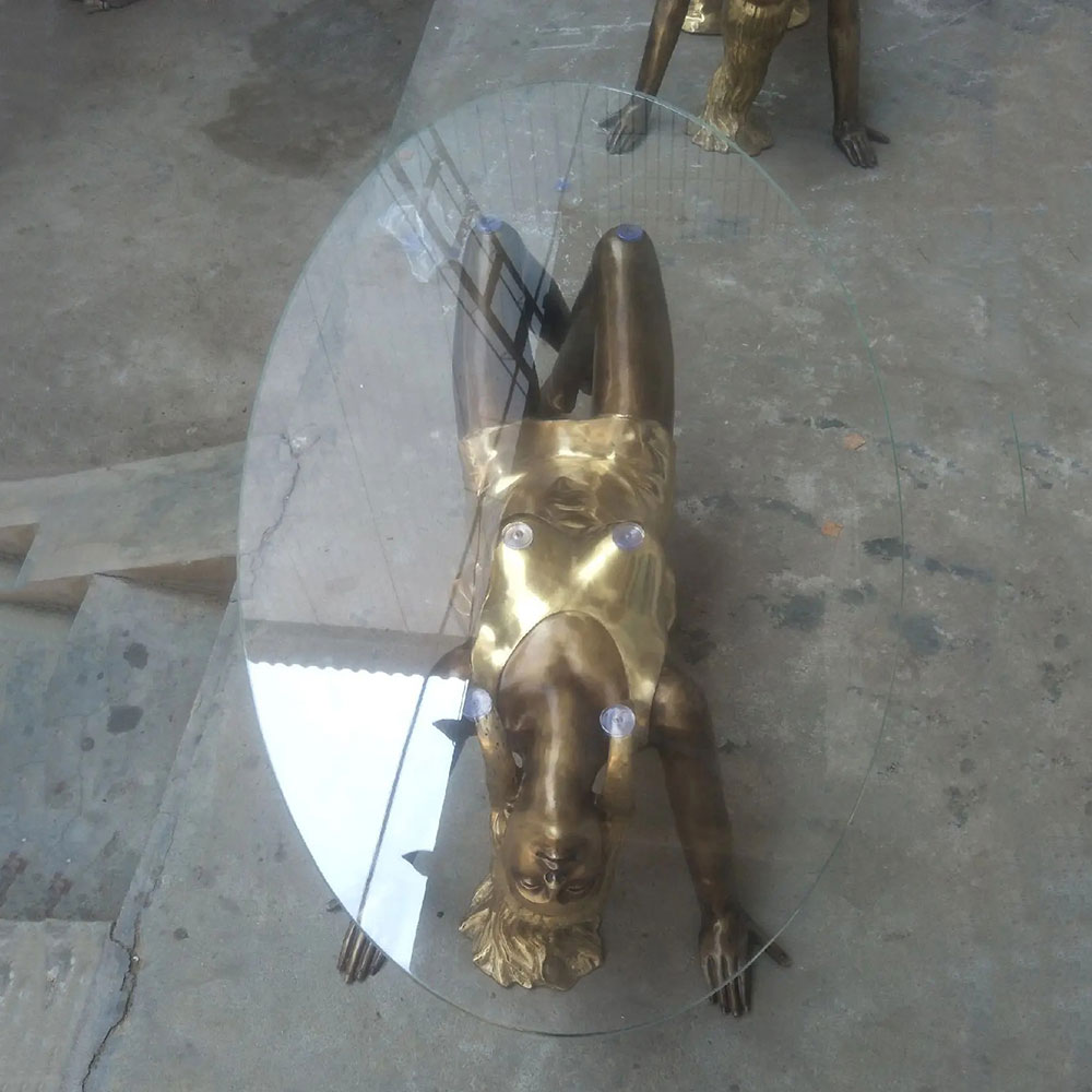 Bronze Woman Sculpture Coffee Table Oval Glass Top