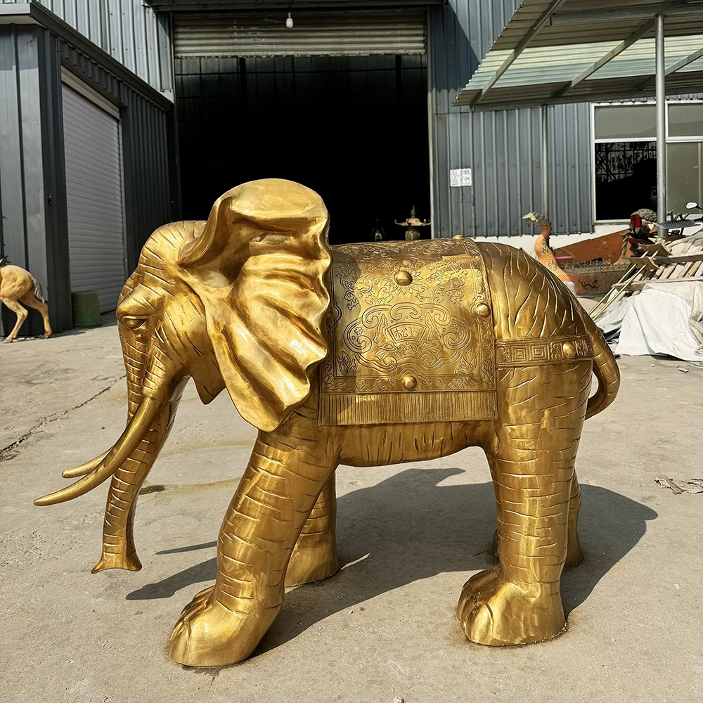 Golden Elephant Sculpture with Engraved Floral Decorations