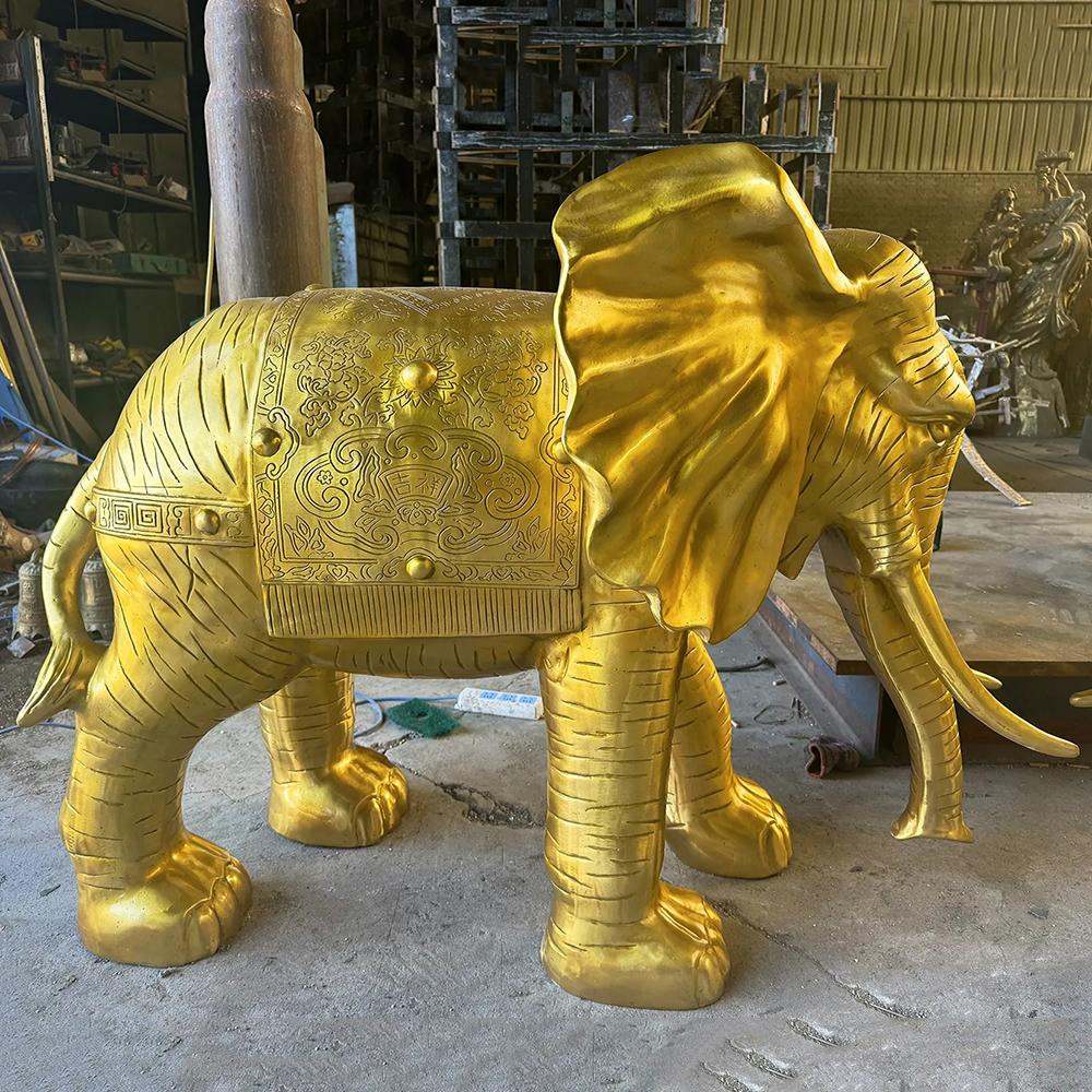 Golden Elephant Sculpture with Ornamental Bronze Saddlecloth