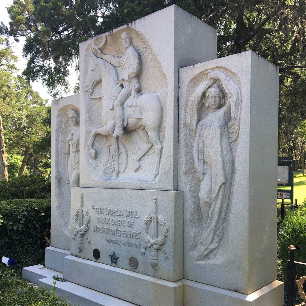 Granite memorial featuring Victory and History figures