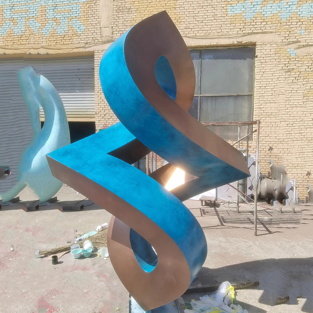 Metal Outdoor Sculpture Abstract with stainless steel ribbons