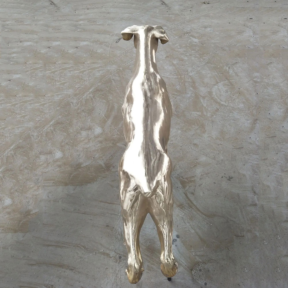 Polished Bronze Doberman Yard Statue from Behind