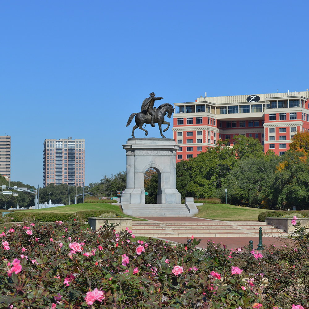 Sam Houston statue beside landscaped park steps