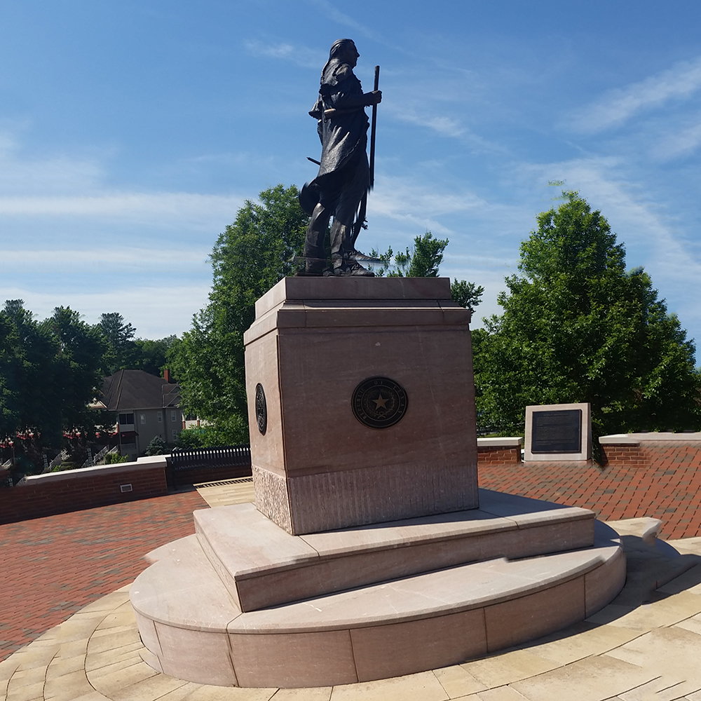 Sam Houston statue with rifle and frontier clothing