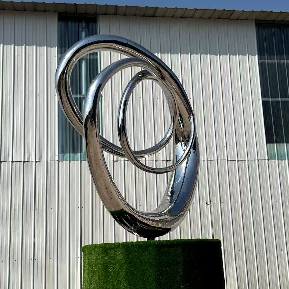 Stainless Steel Loop Statue with Flowing Curves