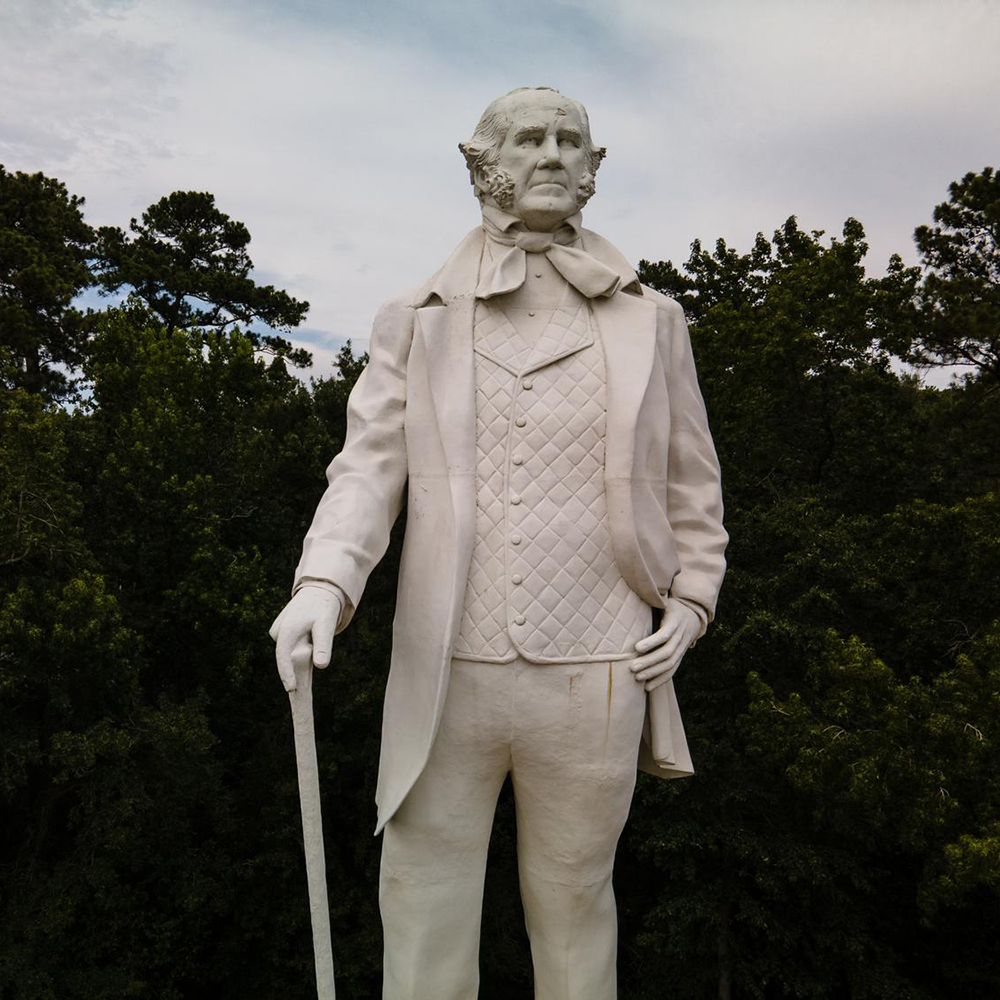 White concrete statue of Texas historical leader