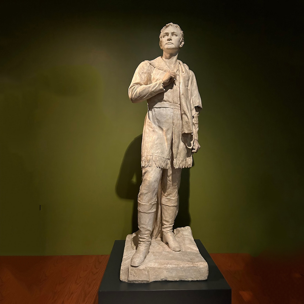 White-marble-standing-sculpture-of-young-Houston