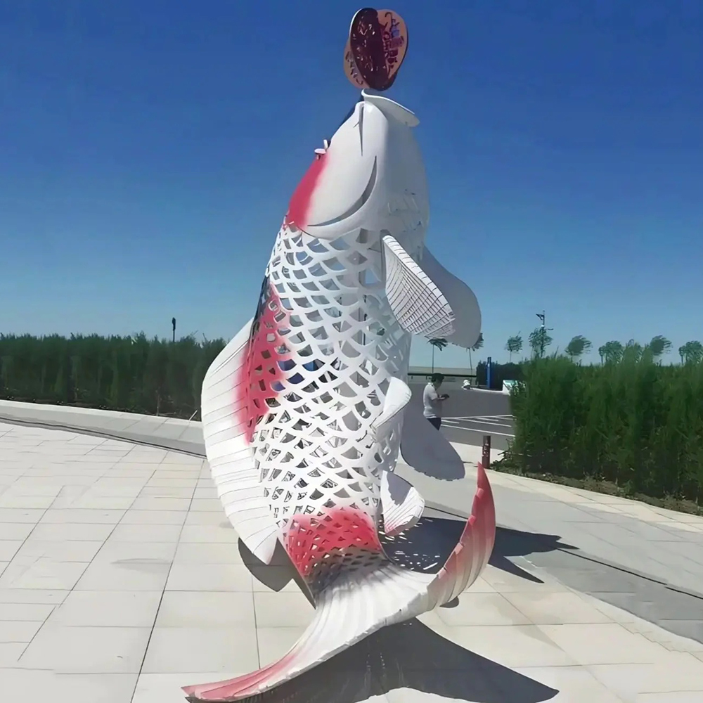 White stainless steel garden koi sculpture leaping upward